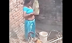 My Neighbour aunty Bathing exhibiting a resemblance her big boobs.