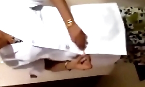 Tamil nurse remove cloths for patients