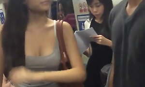 Busty Girl on MRT
