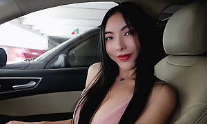 Flawless Chinese babe with DD Tits mock-heroic in wheels